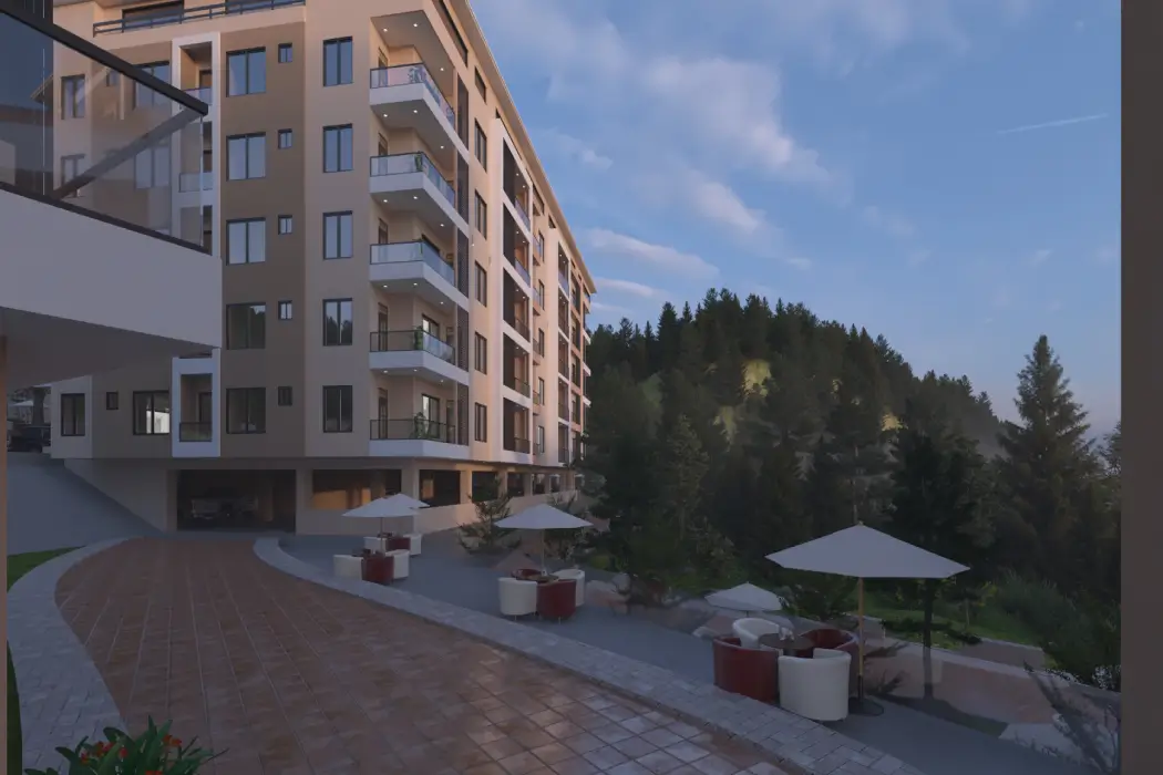Outdoor resident seating beside a residential block